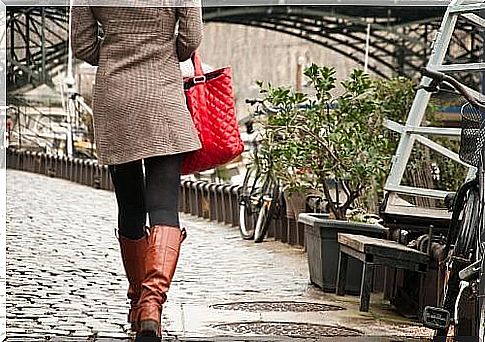 Woman runs towards her bike