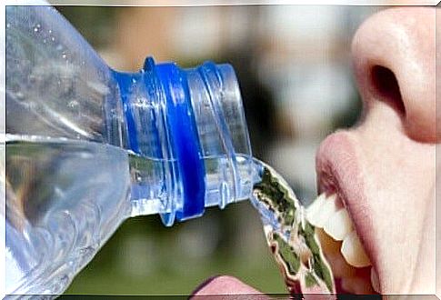 Woman drinks warm water