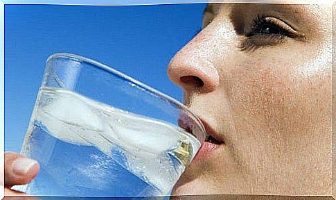 Woman drinks warm water